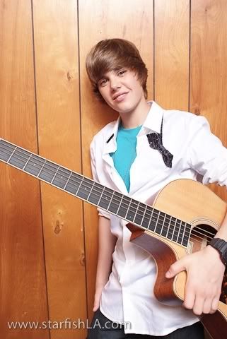justin bieber photoshoots. Justin Bieber with his Guitar