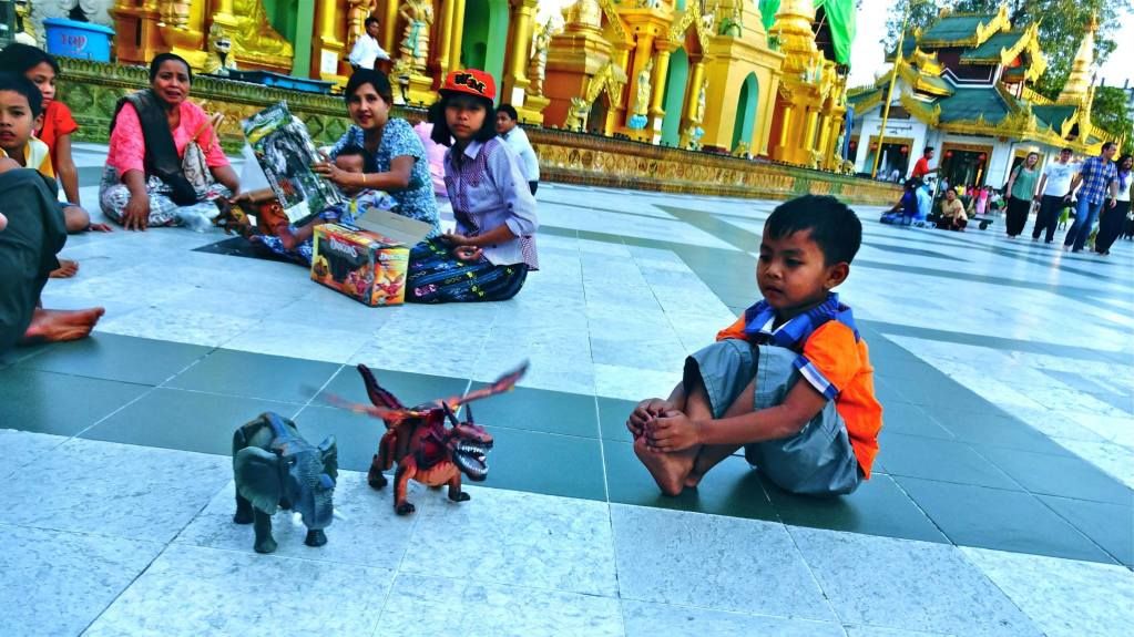 A dragon races an elephant at Shwedagon Paya photo 1557140_10152263641896202_1109002327_o.jpg