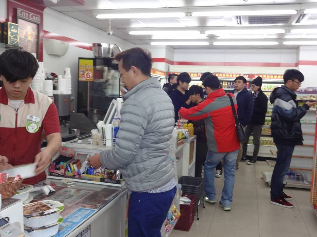 Protesters buying snacks at 7-11, many of which are meant to be passed out and shared with the crowd...VIOLENTLY photo 1890334_10152342229861202_2000784965_o.jpg